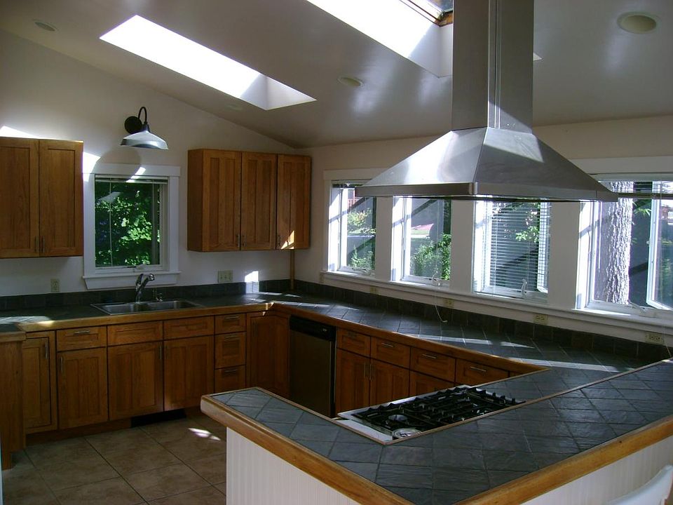 Kitchen with wrap around windows