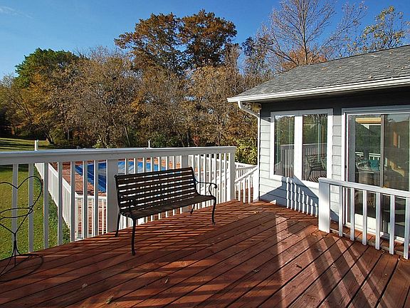 Extensive decking off sun porch.