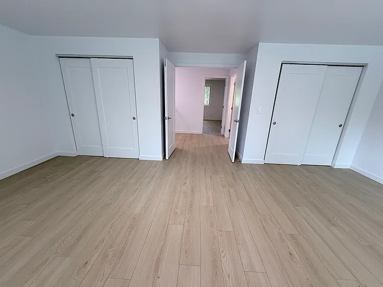 Double closets in grand bedroom for plenty of storage.