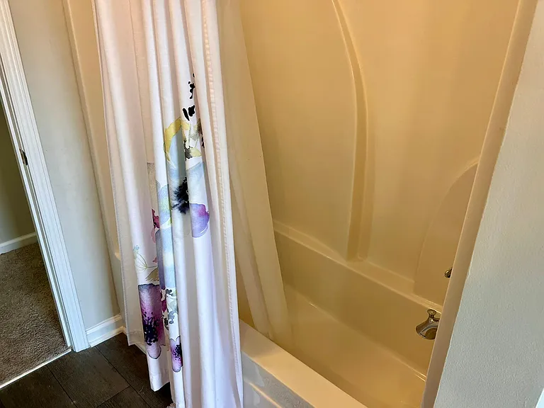 Upstairs master bathroom shower.