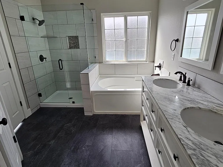 Full glass and tile shower enclosure