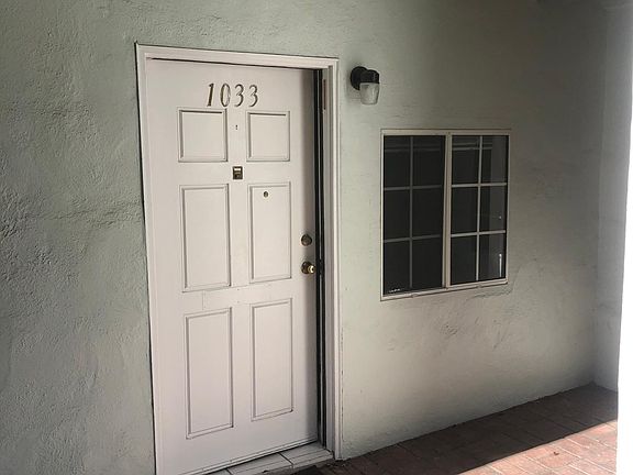 Sunny front patio with room for a cafe table!