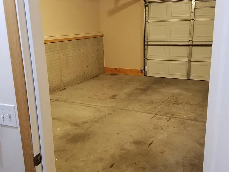 Attached double garage from downstairs doorway