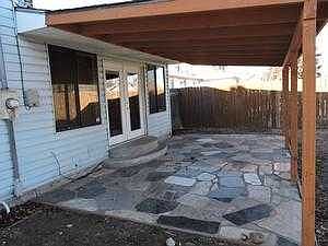 COVERED BACK PATIO OFF FAMILY ROOM