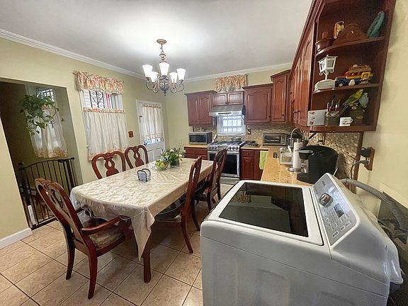 5th image of 38-21 Woodside Ave