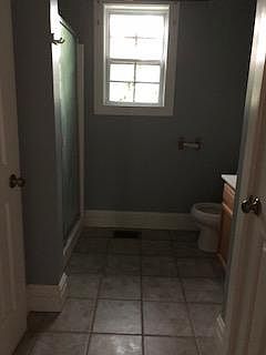 1st floor full bath with 2 closets and shower