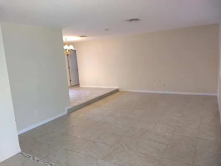 Dining room adjacent to sunken living room