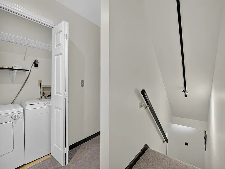 Laundry room and the stairs down to main
