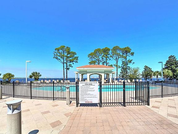 Crystal clear community pool for non beach days, if ever!!