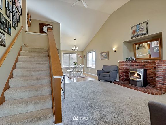 The entry opens to soaring vaulted ceilings.
