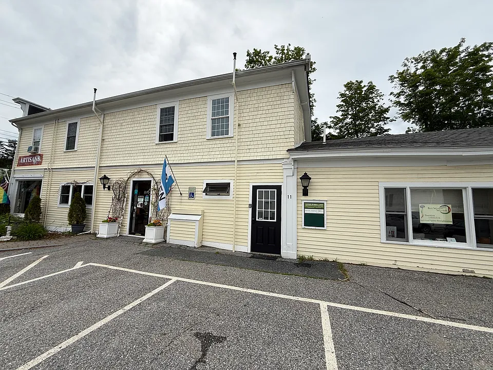The black door in the center of this picture is the shared entry to the upstairs. There are two therapeutic professionals on the opposite side of the upstairs space.