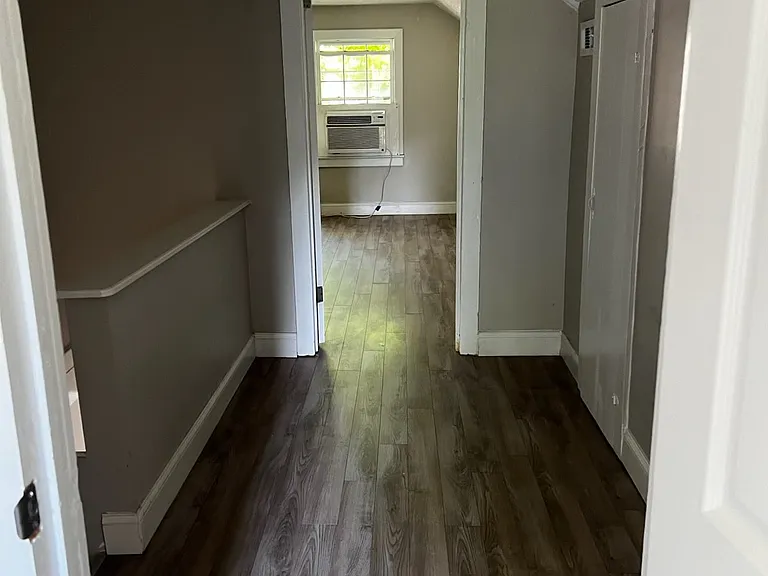 upstairs has a loft/bungalow style bedroom, bathroom, and closet space