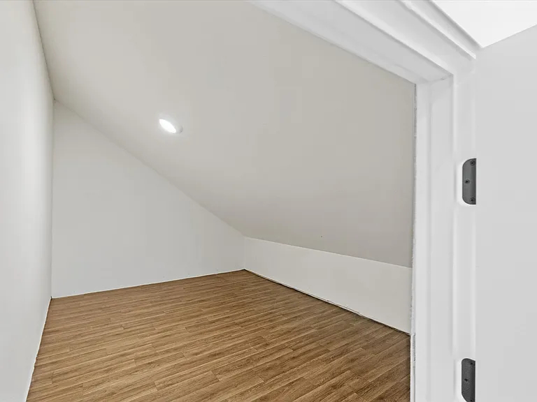 One of the three attic access rooms upstairs.