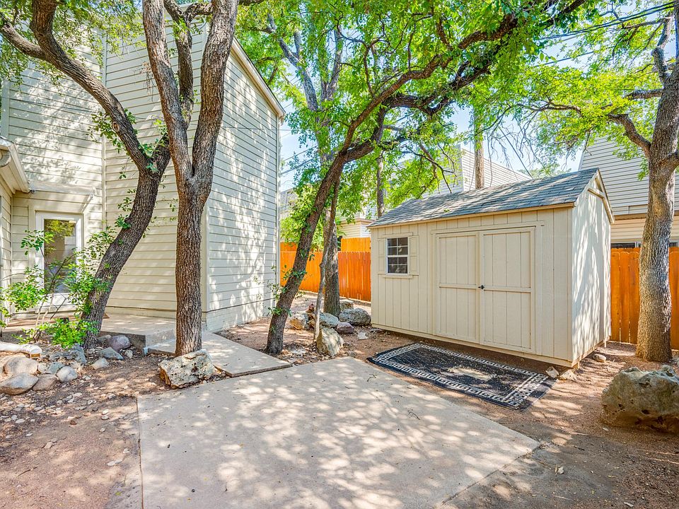 Large canopy covered private backyard with slab for tables, chairs, firepit, etc. 12' x 10' storage shed included for renter belongings.