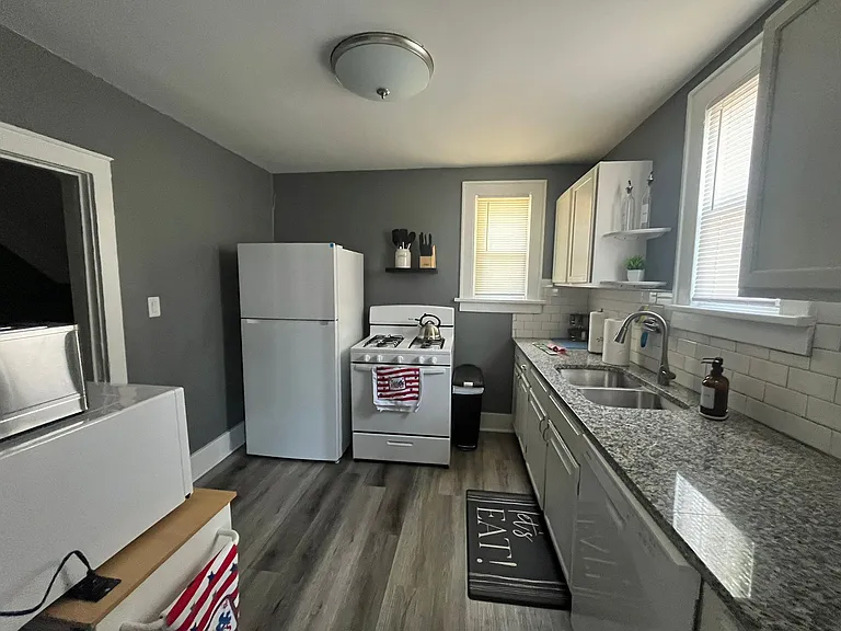 A full kitchen with everything you need. Includes microwave, stove and etc.