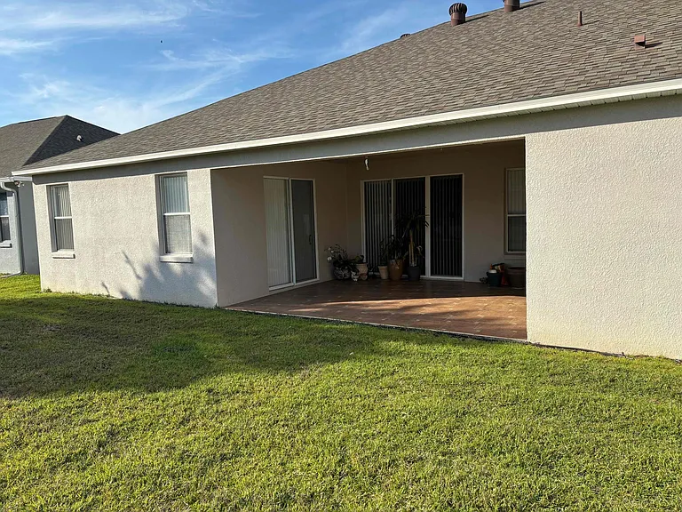 Tiled and covered back patio