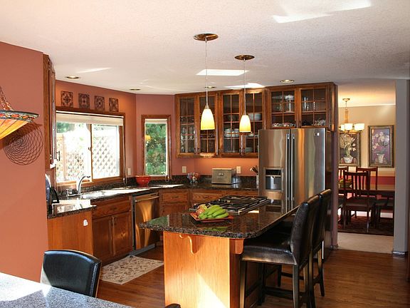 Slab granite countertops and stainless Dacor appliances