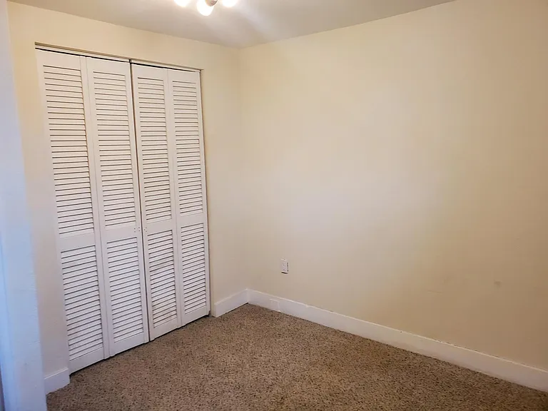 Large closet in secondary bedroom/office. No furniture pictured