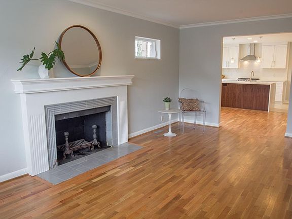 Gorgeous fresh real hardwood floors and Walnut kitchen Island. Charming, Upbeat and Meticulous.