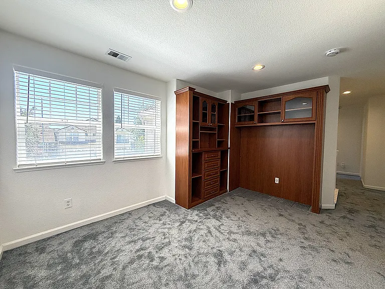 Loft with Built-In Shelving