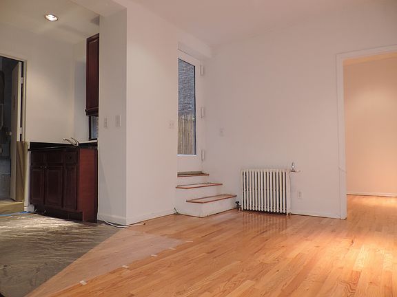 Living room with entrance to private deck