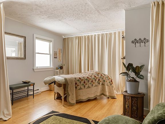 Set up as yoga/meditation space in this photo. Kitchen is behind the curtain.