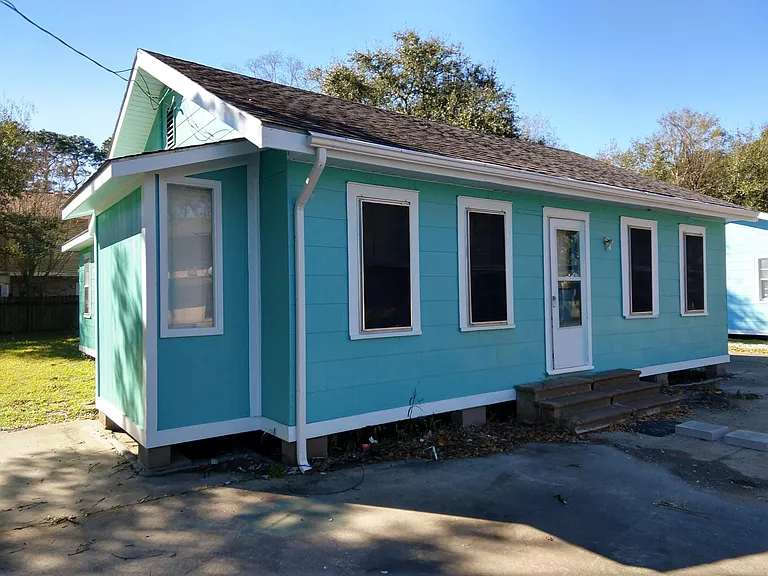 Front of house with parking
