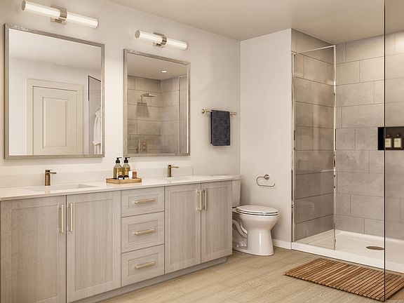 Thoughtful bathroom design at Modera Walsh Heights pairs clean finishes with a spacious layout for a polished, comfortable retreat.