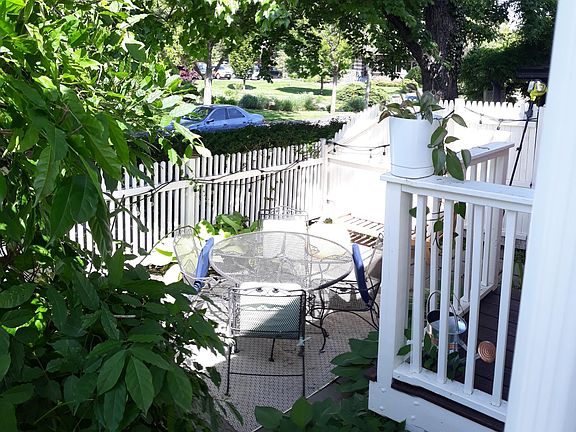 private side patio overlooking park and library view 3