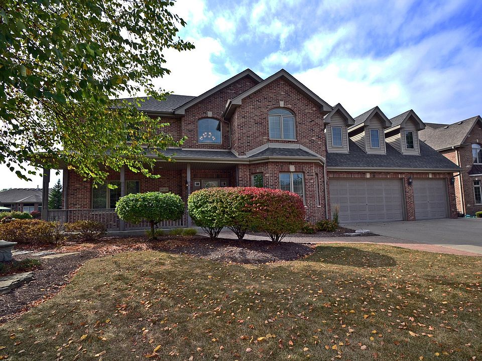 Brick 2 Story with 3 Car Garage