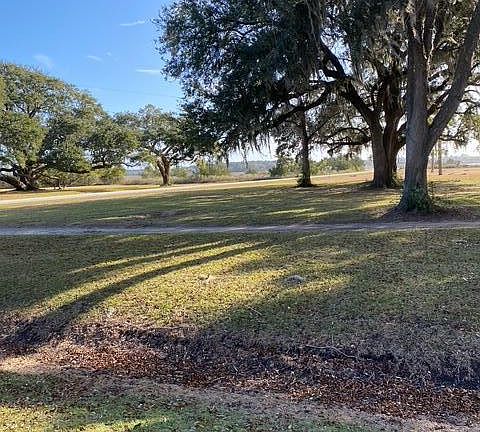 5th image of 7063 Whistling Alligator Way