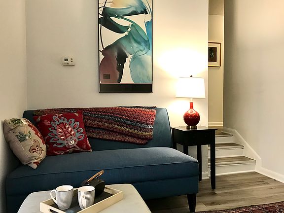 LR with 3 stairs to hallway