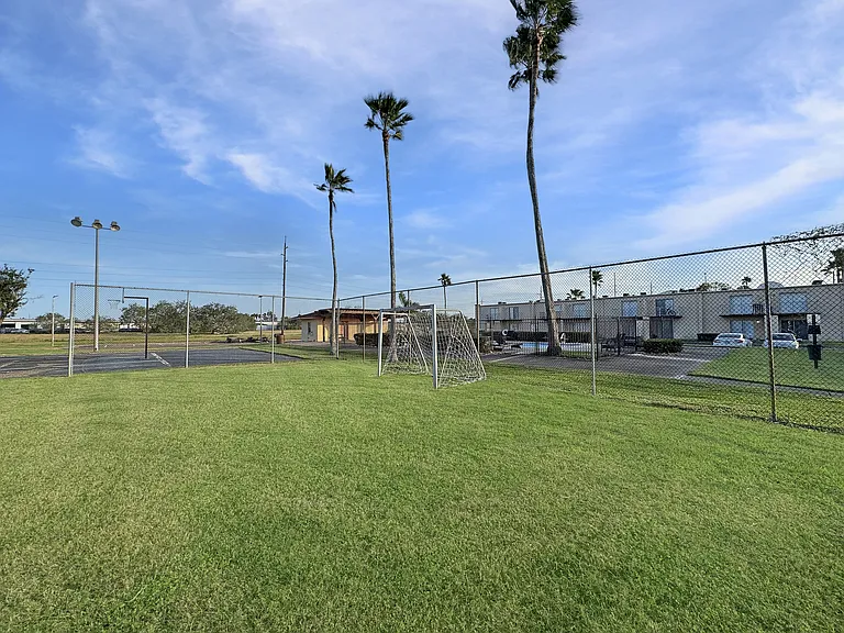 On-site soccer field for resident recreation at Los Cedros Apartments in Brownsville, Texas.