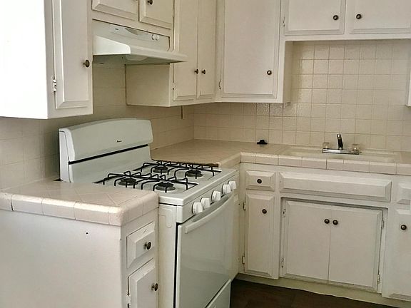 Kitchen with refrigerator and stove