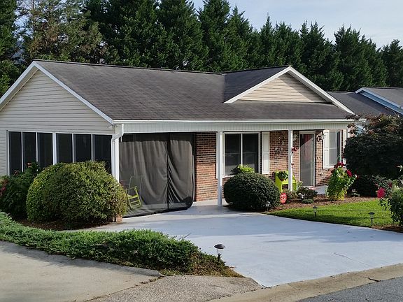 Screened-in carport