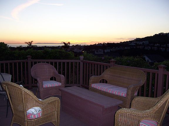 Sunset view of ocean and Catalina Island from backyard deck.
