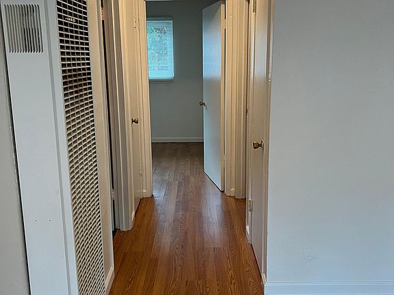 hallway leading to 2 bedrooms 1 bath