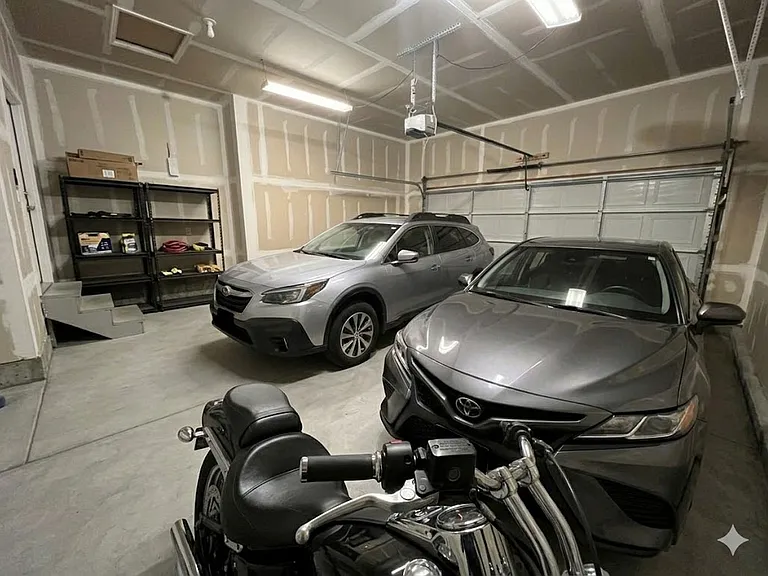 AI decorated photo.
NOTE: House is unfurnished, but the black shelving shown, does exist.