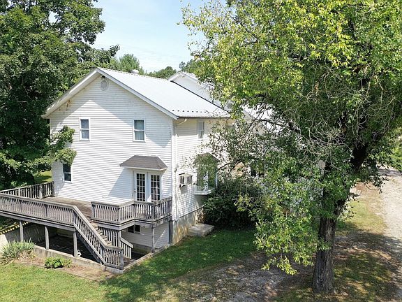 Back view of the large 7 bedroom 3 bath home