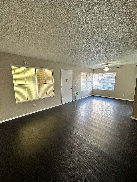 View from corner of the living room towards dining area/kitchen