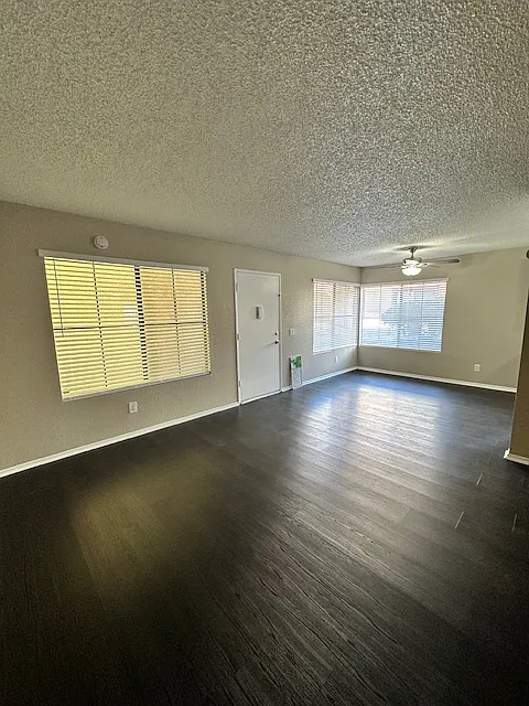 View from corner of the living room towards dining area/kitchen