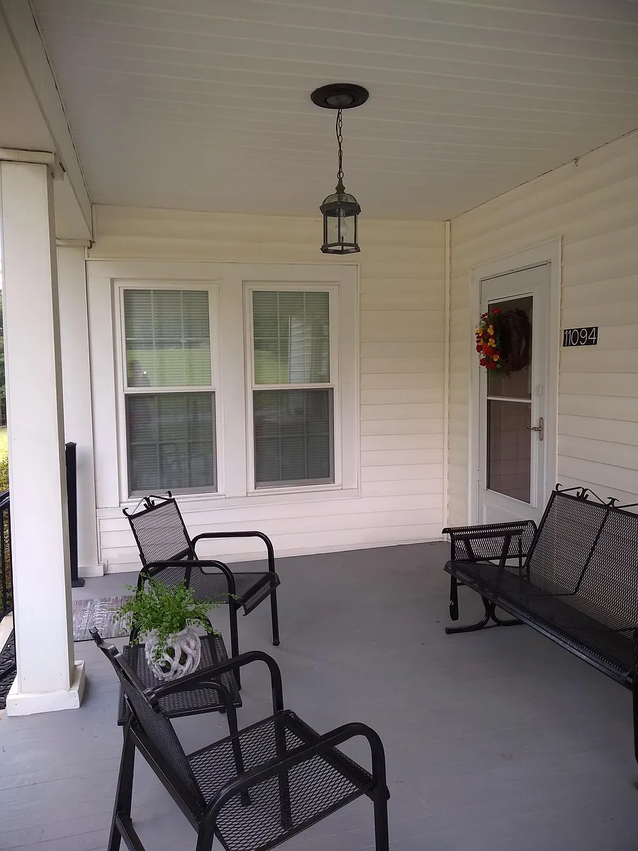 Furnished front porch for those relaxing evenings. - 11094 Porterfield Hwy