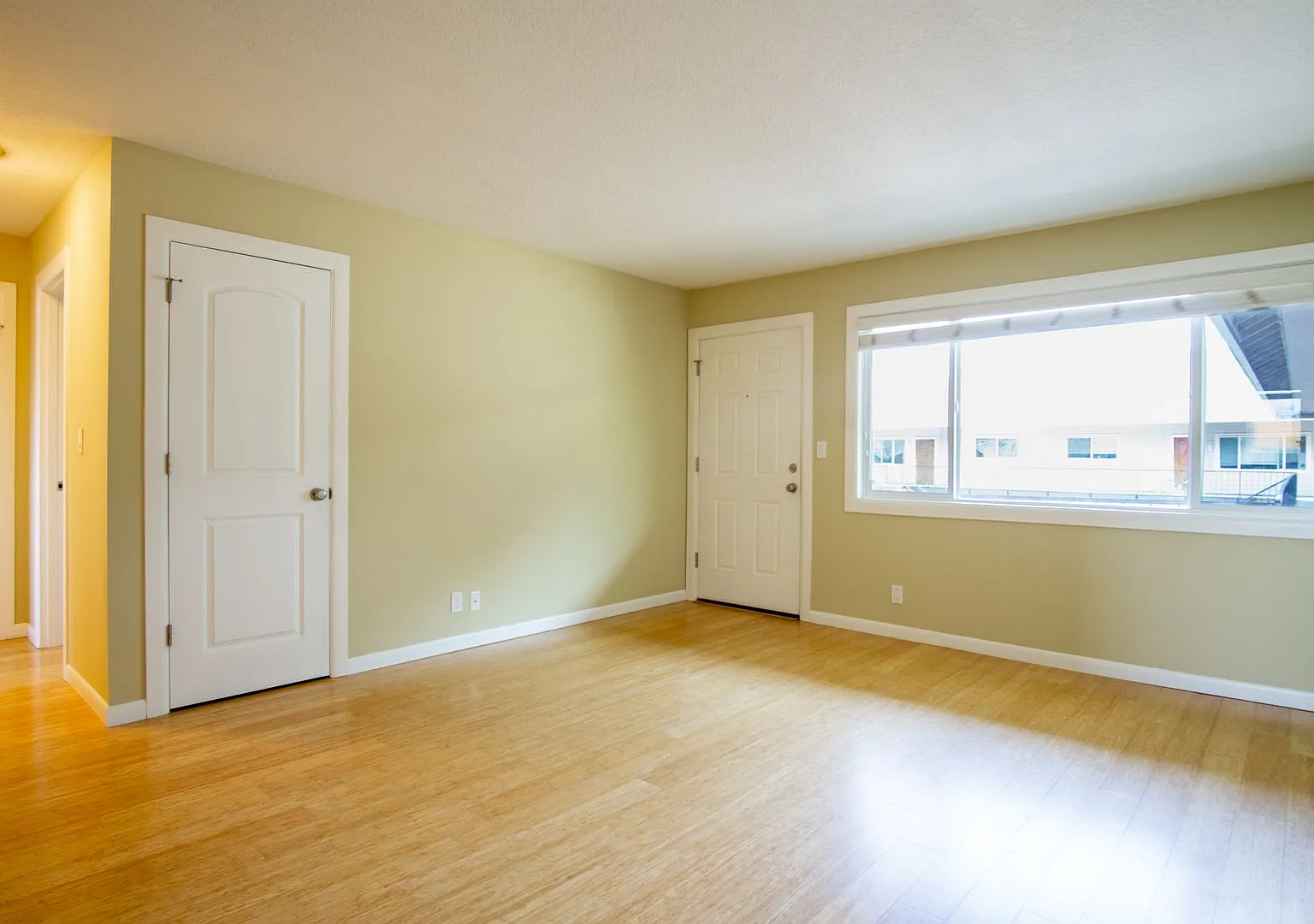 Get 1 Month FREE+ Apps are on US! Top-Floor 2-Bedroom with Bamboo Flooring + Off-Street Parking! — Photo 4