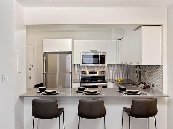Stainless steel appliances in select units