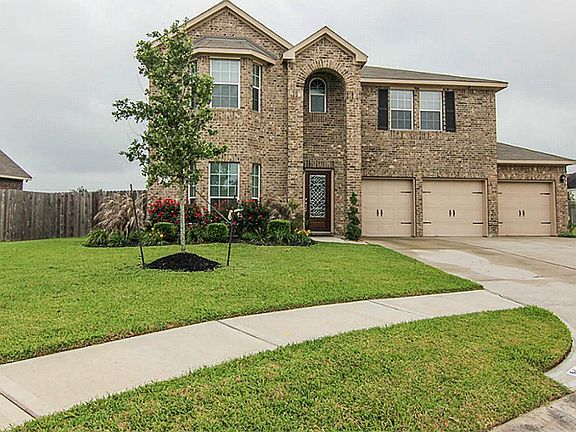 It sits on a large lot on a quiet cul-de-sac street.