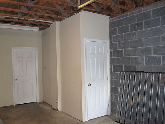 Storage closet & entrance through laundry room to stairway to main floor.