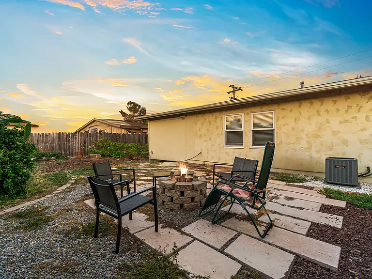 Outdoor space featuring a cozy fire pit, perfect for gathering and enjoying starry nights!
