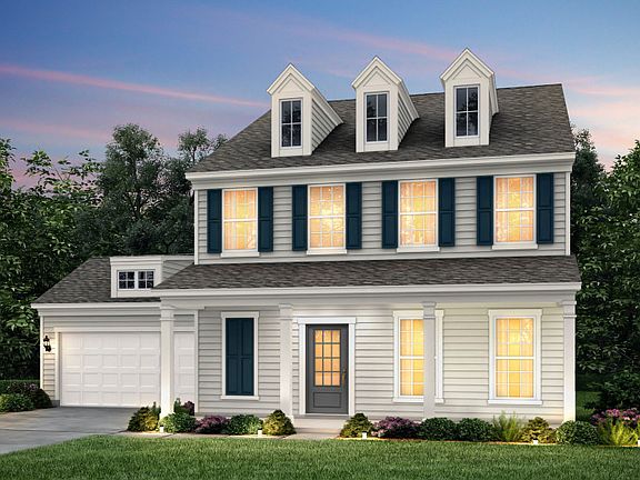 Foxfield Exterior 3 w siding, front sitting porch and 2 car garage