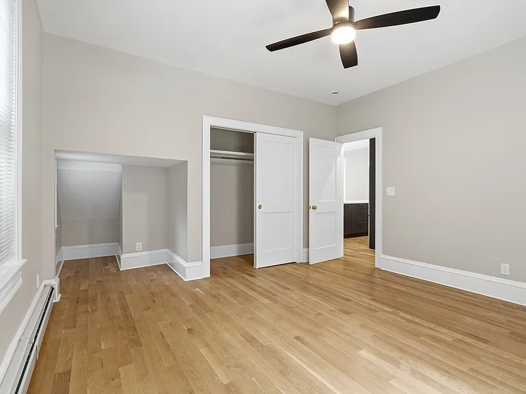 The stunning main bedroom has plenty of space for all your needs.