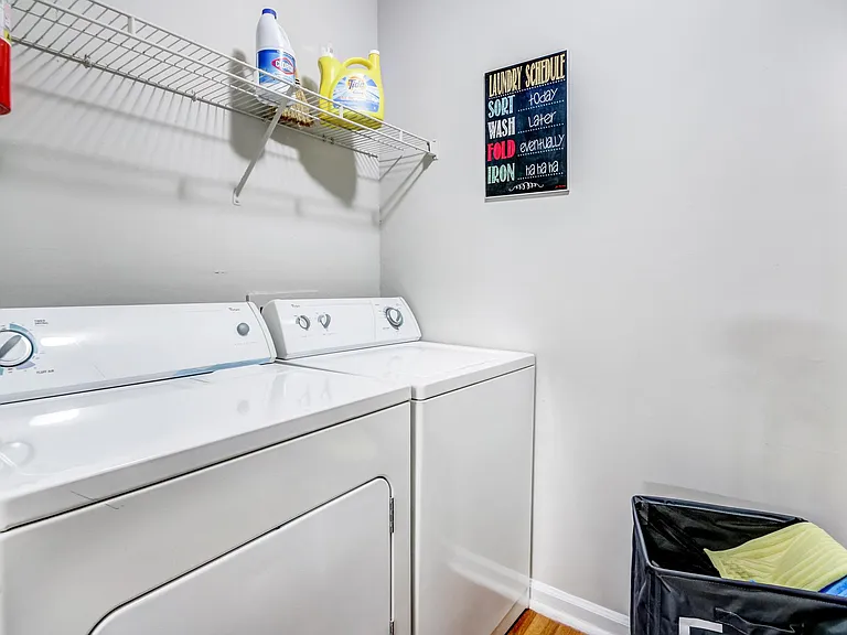 Laundry room with washer and dryer included